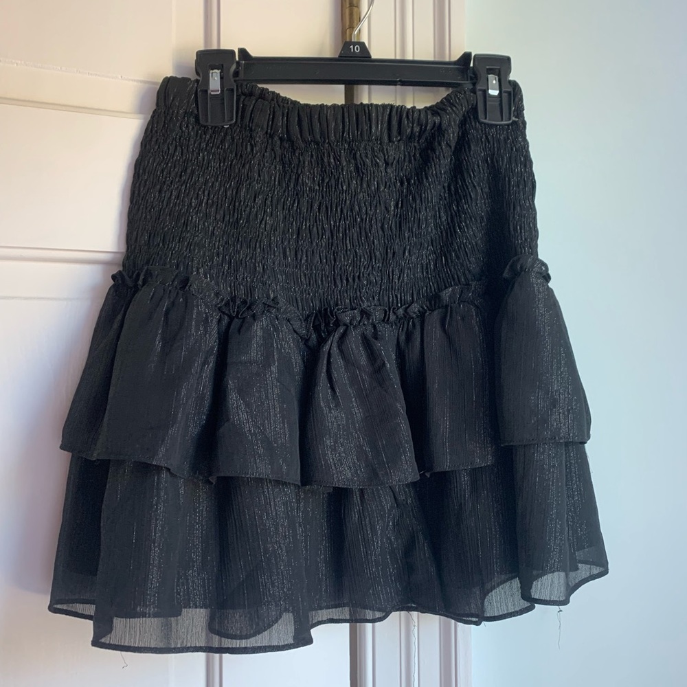 Shiny black smocked skirt